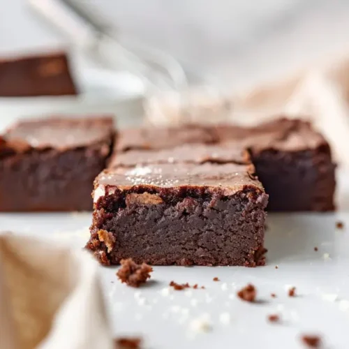 fudgy almond flour brownies one bowl wonder sliced into clean squares on a neutral background